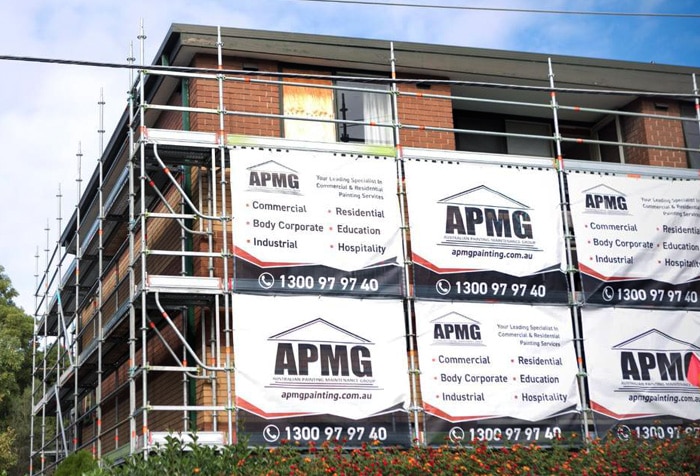 APMG Painting job using scaffolding around apartment building